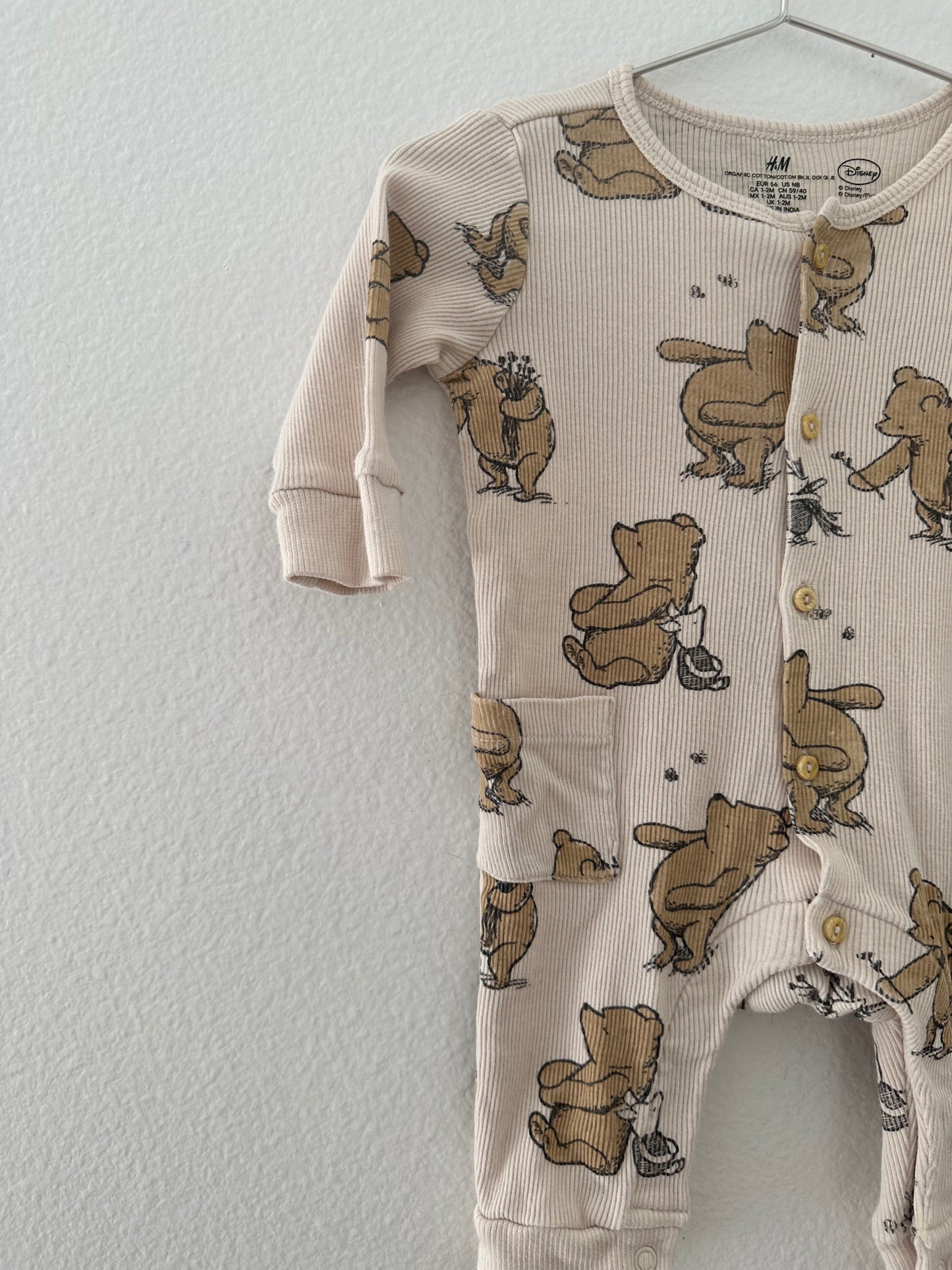 H&M Winnie the Pooh romper (NB)