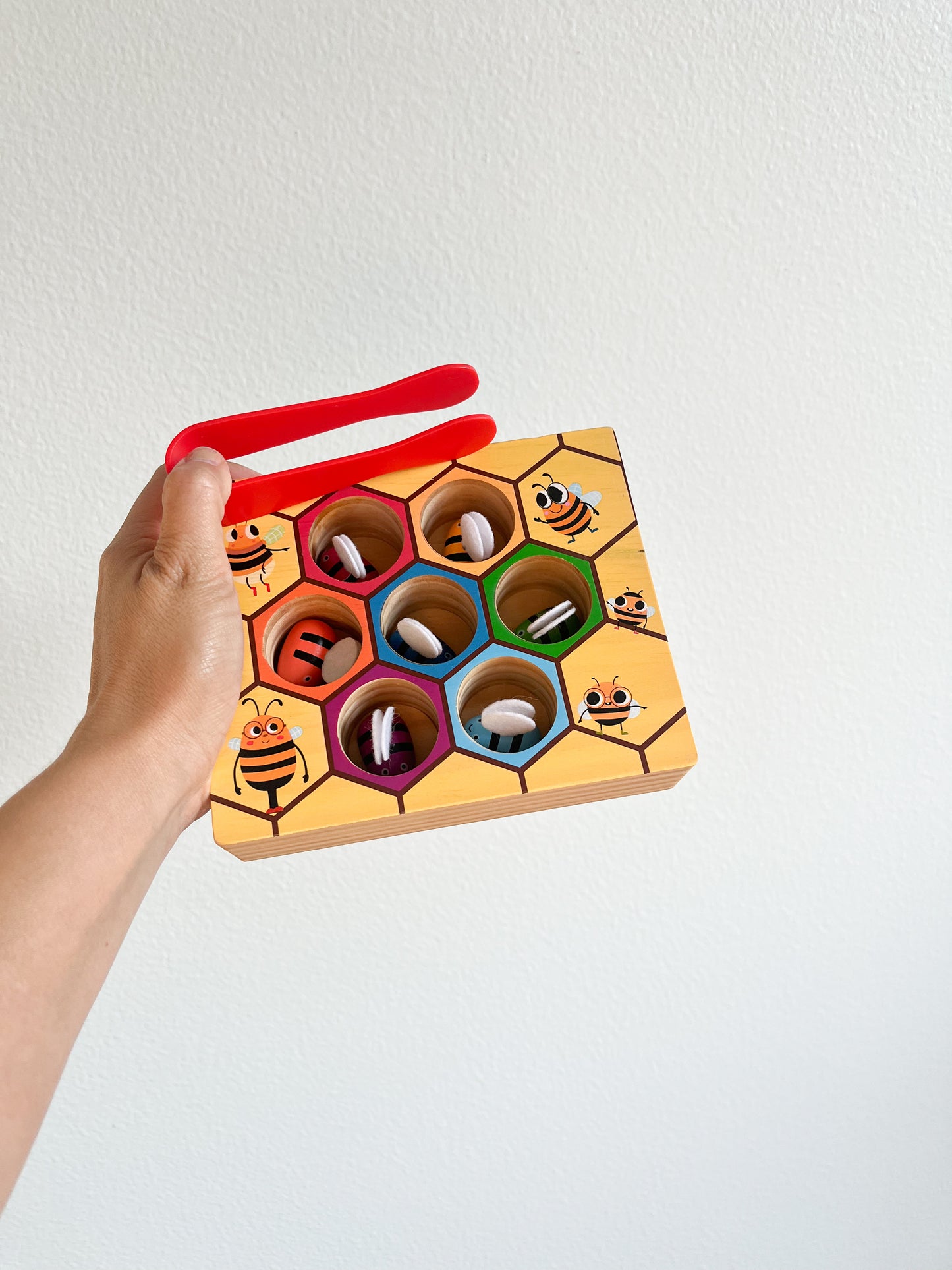 Wooden beehive color sorting game