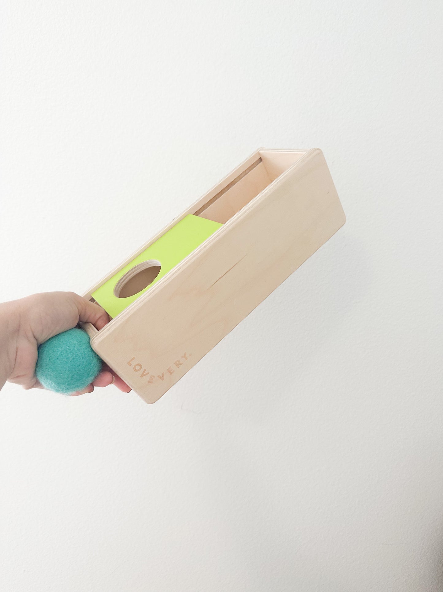 Lovevery sliding top box in