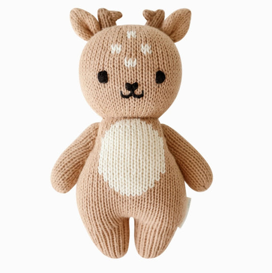 Cuddle + kind baby fawn