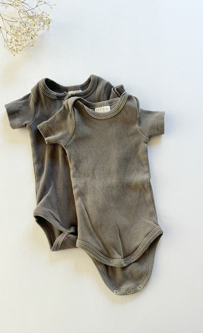 Two Mebie baby ribbed bodysuits (0/3)