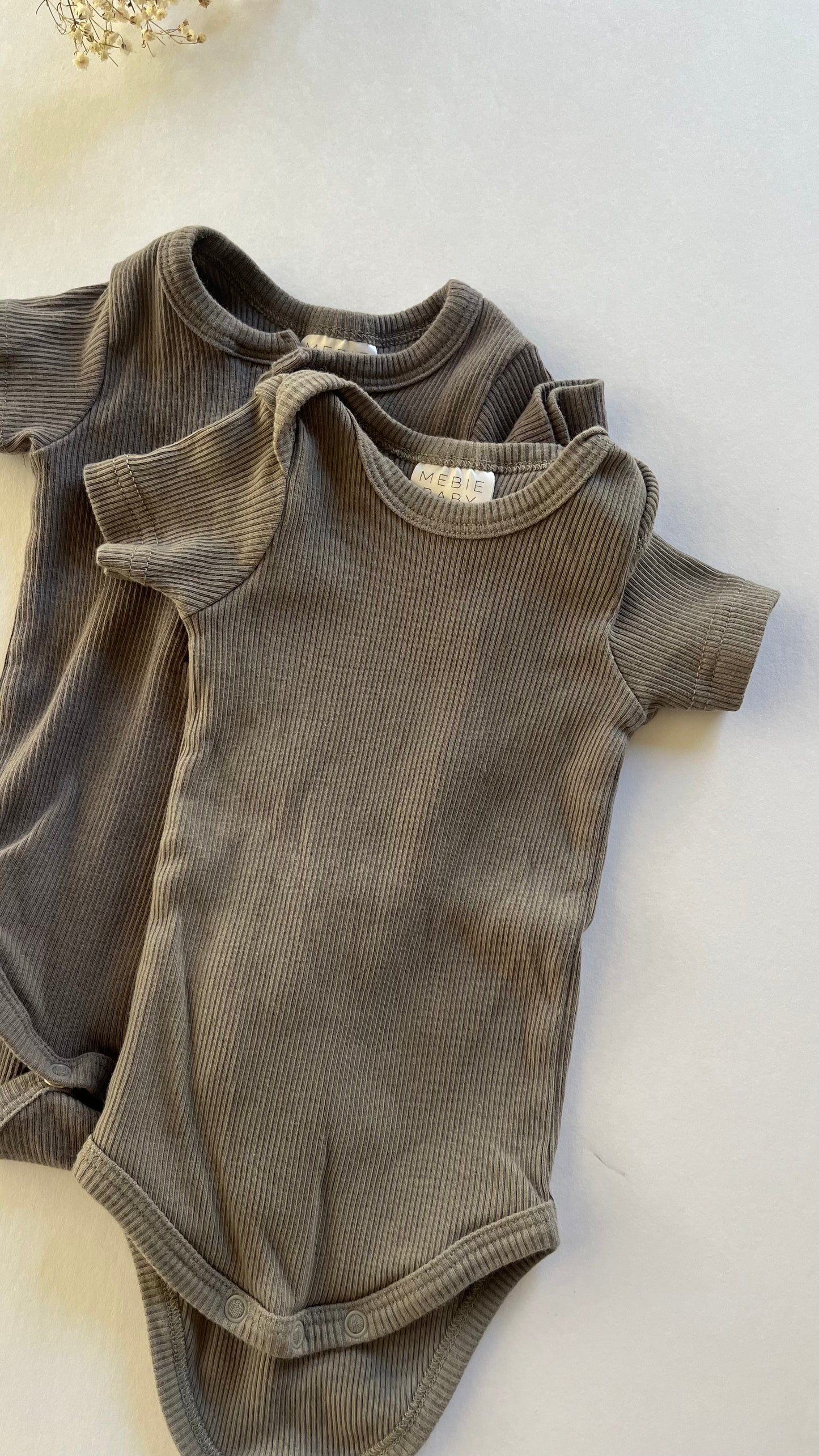 Two Mebie baby ribbed bodysuits (0/3)